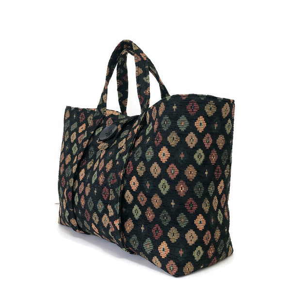 black upholstery knitting bag